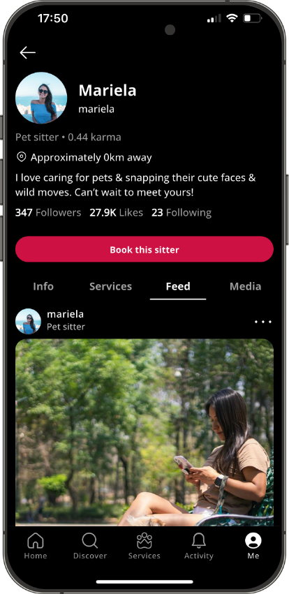 Smartphone showing a pet sitter profile on the Petme app