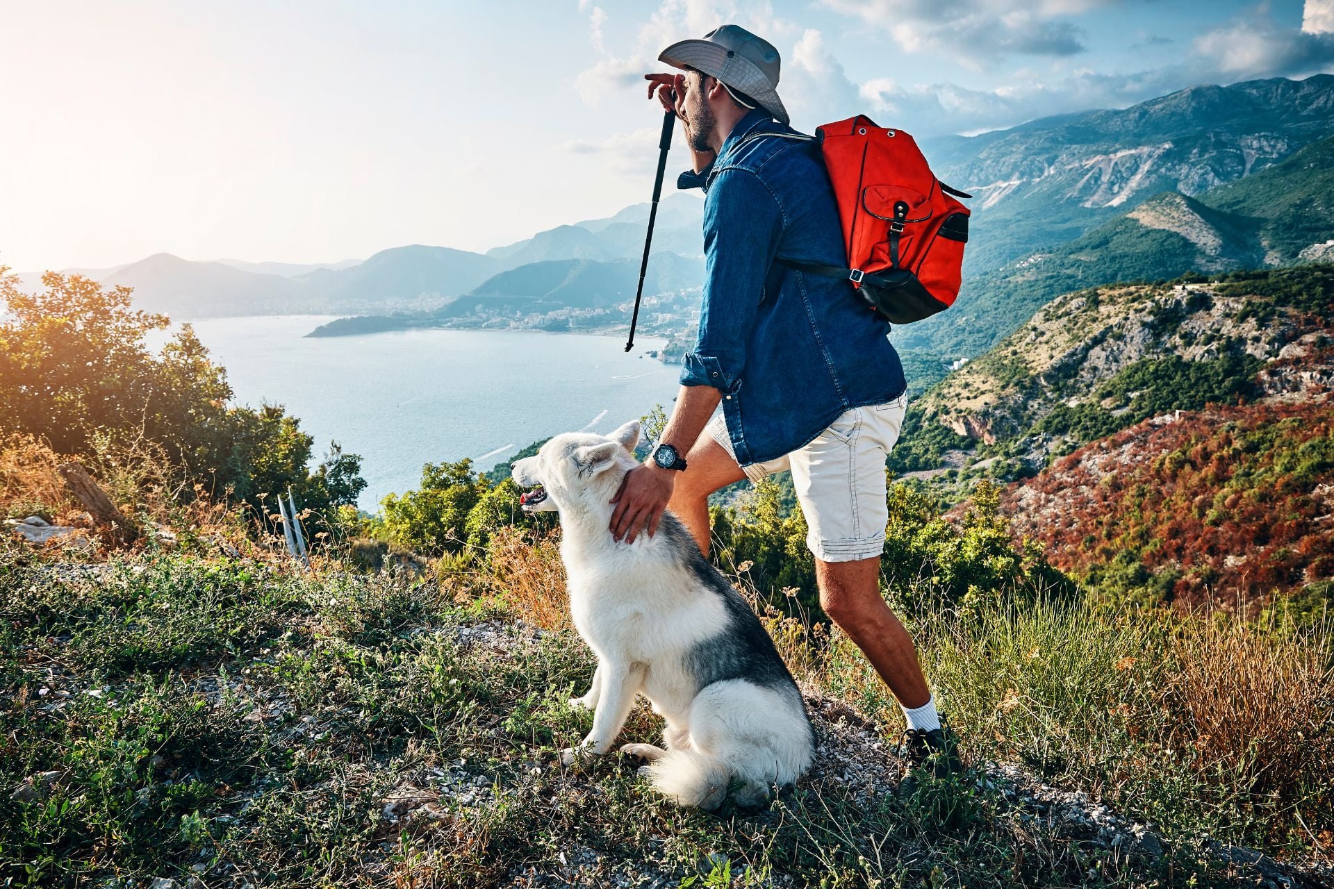 Man hiking with a dog