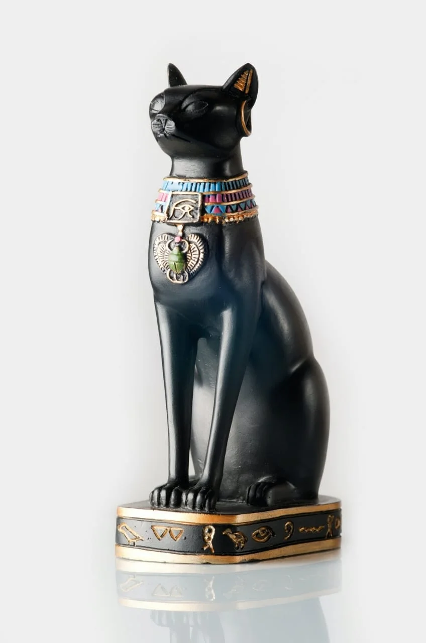 Bronze statue of a cat